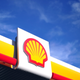 The Shell logo at a gas station.